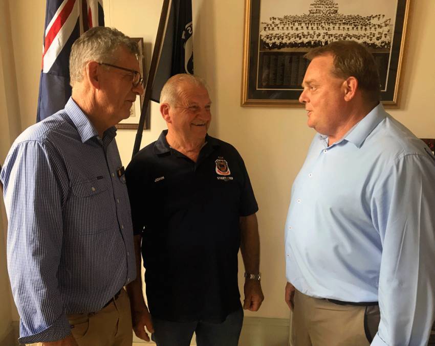 Gippsland East Nationals MP Tim Bull, discusses with Stratford RSL Sub Branch Vice President John Harrap and Secretary Michael Hutchison their plans for building improvements.